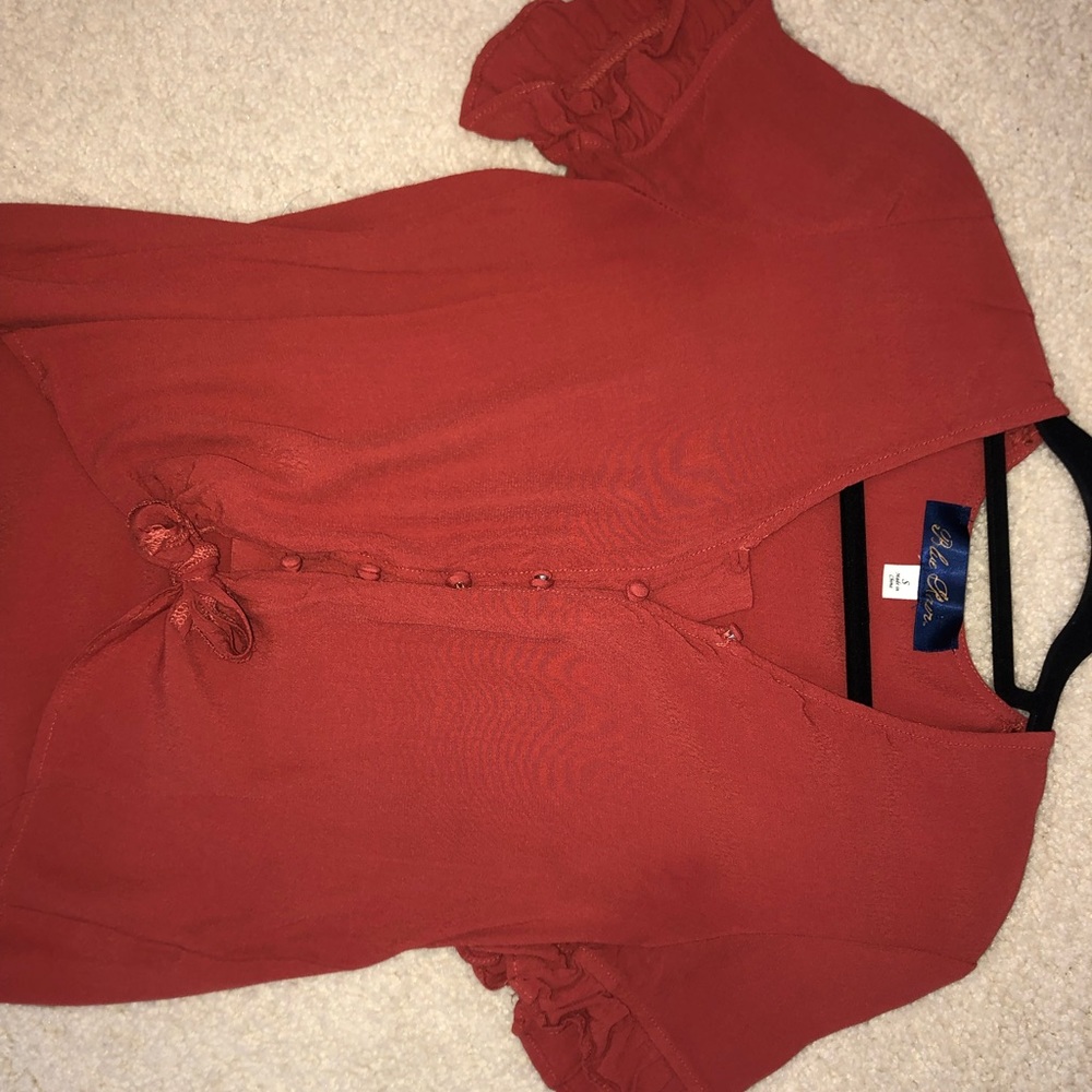 Red button up blouse